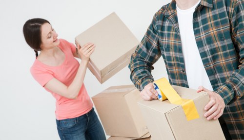 Office relocation planning in Balham with moving boxes and workspace setup