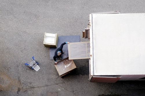 Removal van and moving boxes in Balham residential street