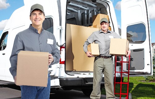 Commercial movers coordinating an office move in Balham street setting