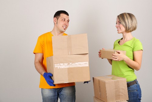 Removal team reviewing service quote and access details