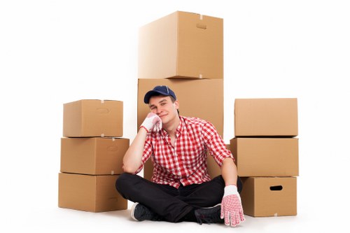 Boxes and furniture arranged inside a moving truck in Balham